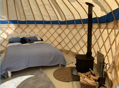 The inside of the buzzard yurt in West Kellow Yurts